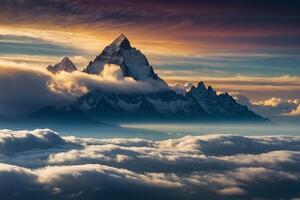 a mountain is seen above the clouds photo