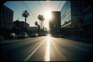 a view of the sunset from a street in downtown los angeles photo