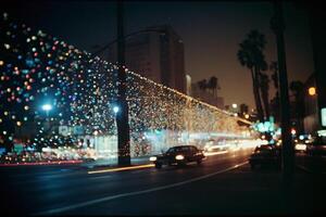 a car driving down a street with lights on it photo