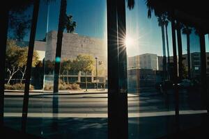 the sun is setting behind a street sign photo