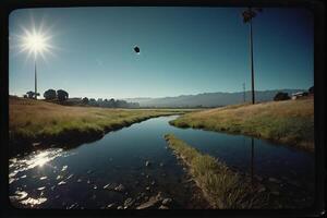a river with a kite flying over it photo