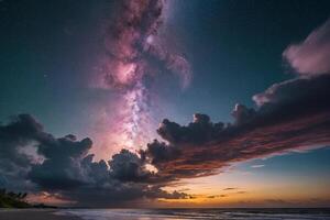 the milky way over the ocean at night photo