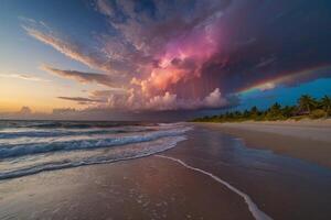 a colorful sunset over the ocean and beach photo