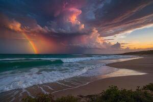 a colorful sunset over the ocean and beach photo