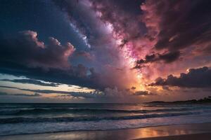 a rainbow is seen over the ocean at night photo