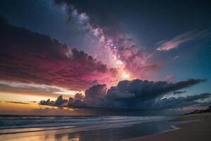 a rainbow is seen over the ocean at night photo