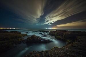 ai generado río fluye terminado rocas a puesta de sol foto