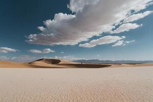 a desert with sand dunes and clouds at sunset photo