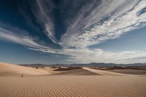 a lone person stands in the middle of a desert photo