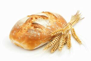 A loaf of white bread with ears of wheat on a white background. photo