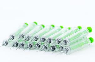 Medical background of green syringes photo