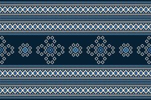 Traditional ethnic motifs ikat geometric fabric pattern cross stitch.Ikat embroidery Ethnic oriental Pixel navy blue background. Abstract,illustration. Texture,decoration,wallpaper. vector