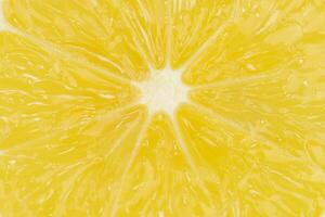 Macrophotography of sliced lemon structure - lemon background photo