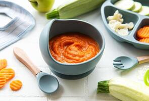 Healthy baby food in bowl. photo