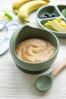 Healthy baby food in bowl photo