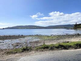 A view of the Isle of Arran in Scotland on a sunny day photo