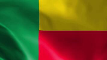 Benin vlag fladderend in de wind. gedetailleerd kleding stof textuur. video