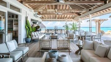 Elegant Coastal Beach Club with Open-Air Dining Area Overlooking Crystal-Clear Caribbean Waters photo