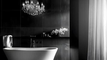 Elegant Monochrome Bathroom Design with Freestanding Tub and Crystal Chandelier photo