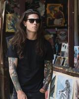 Black Tshirt mockup, featuring a rebel look male model photo