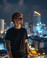 Young Caucasian Adult in Blank Black T Shirt photo