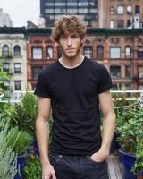 Young Caucasian Adult in Blank Black T Shirt photo