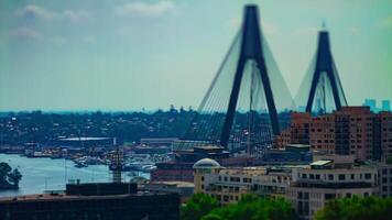 A timelapse of miniature traffic jam at Anzac bridge in Sydney high angle tiltshift tilting video