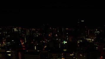 een dageraad timelapse van stadsgezicht in tokyo hoog hoek breed schot zoom video