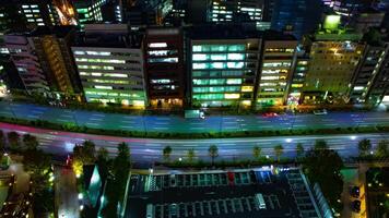 A night timelapse of street at the urban city in Tokyo wide shot video