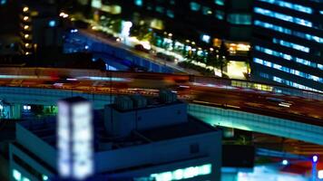A night timelapse of highway at the urban city in Tokyo tiltshift tilting video