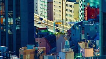 A timelapse of cityscape at the urban city in Tokyo long shot high angle zoom video