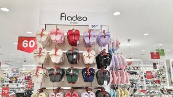 Jakarta, Indonesia on December 21 2023. Fladeo brand sandals on display for sale at a Matahari Department Store. photo