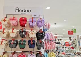 Jakarta, Indonesia on December 21 2023. Fladeo brand sandals on display for sale at a Matahari Department Store. photo