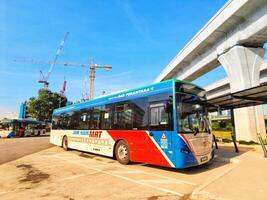 Putra Jaya, Malaysia on May 22 2023. A Feeder Bus is one of the main vehicles for Malaysians. Let's take the MRT. photo