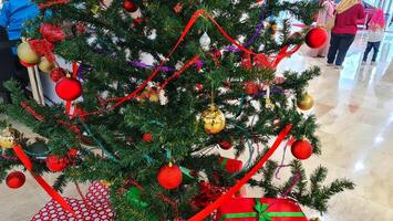 Pile gifts under the Christmas tree. Merry Christmas. Colorful gifts. photo