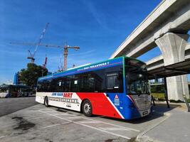 Putra Jaya, Malaysia on May 22 2023. A Feeder Bus is one of the main vehicles for Malaysians. Let's take the MRT. photo