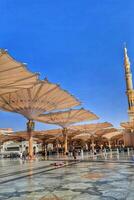 Medina, Saudi Arabia on March 1, 2024. Umbrellas spread across the Medina Haram Piazza or Al-Masjid An-Nabawi Umbrellas are open umbrellas erected in the Al-Masjid an-Nabawi square, Medina, Arab photo