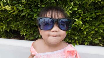 Baby female woman lady girl child kid son person people human wear glasses pretty beautiful happy smile portrait cute childhood mother little enjoy infant adorable summer season lifestyle parent love photo