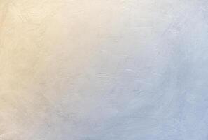Stone texture light yellow - blue color gradient. Abstract unique and attractive design background photo