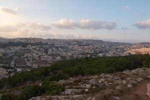 Landscape from the Jumping Mountain in Nazareth. Panoramic view. Sunset photo