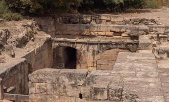 Beautiful stone desert mountain landscape of Israel. Ruins of the old ancient city photo