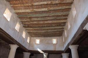 Ruins of the synagogue in Jesus Town of Capernaum, Israel. Reed roof. Columns photo