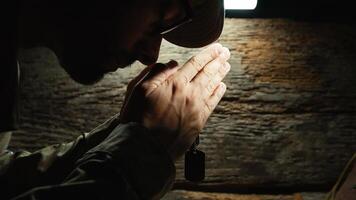 Man Military praying on memorial day photo