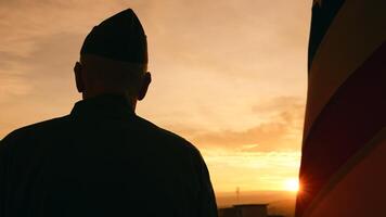 Veteran Stand Against The American Flag For Memorial Day photo