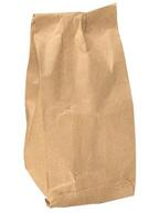 Brown kraft paper bag for packaging products in stores on an isolated background photo