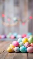 Colorful eggs with copyspace on wooden floor with bokeh background. Easter egg concept, Spring holiday photo
