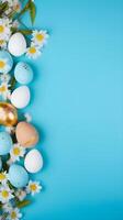 Colorful eggs with copyspace on blue background. Easter egg concept, Spring holiday photo
