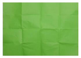 Green folded sheet of paper on isolated background photo