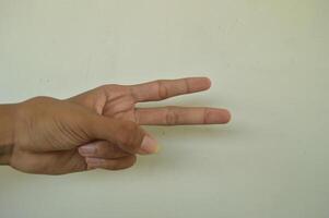 Man's hand isolated on white background. male hand gestures with various movements. Close-up of an elegant palm facing upwards with space for your product. various hand gestures photo