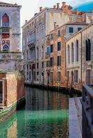 Venice, Italy - april 2,2023. Venice Grand Canal, tourists riding gondolas photo